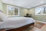 Second first level bedroom with a queen bed